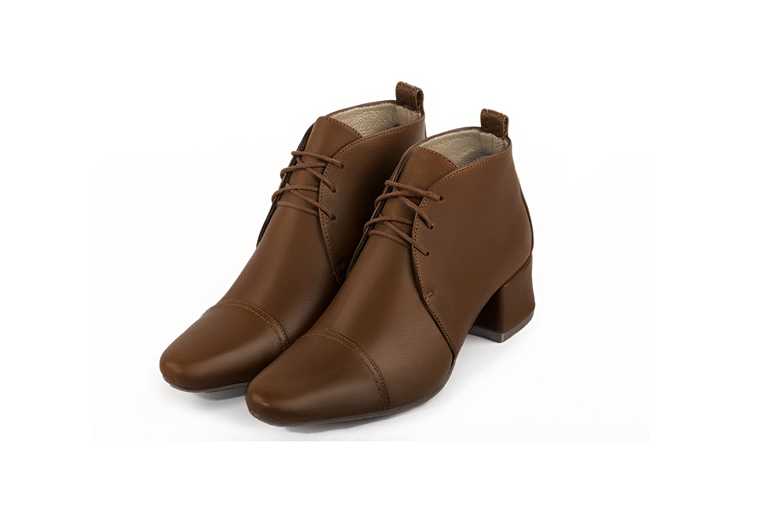 Caramel brown women's ankle boots with laces at the front. Round toe. Low flare heels. Front view - Florence KOOIJMAN
